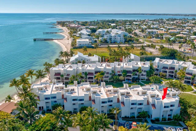 a view of a swimming pool with an outdoor space and seating area