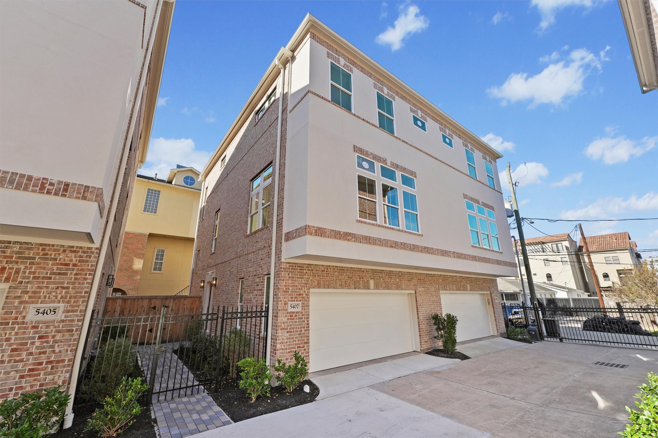 5407 Dickson Street Houston, TX 77007 - Photo 1 of 31 a front view of a building with many windows