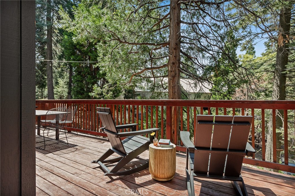 373 Summit Road Lake Arrowhead, CA 92352 - Photo 16 of 41 a view of a balcony with chairs