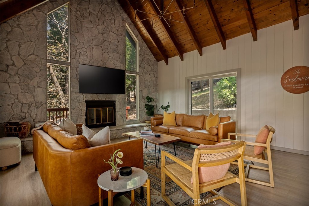 373 Summit Road Lake Arrowhead, CA 92352 - Photo 19 of 41 a living room with fireplace furniture and a flat screen tv