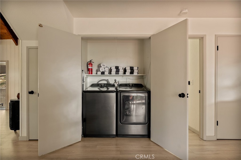 373 Summit Road Lake Arrowhead, CA 92352 - Photo 22 of 41 a view of a storage & utility room in a house