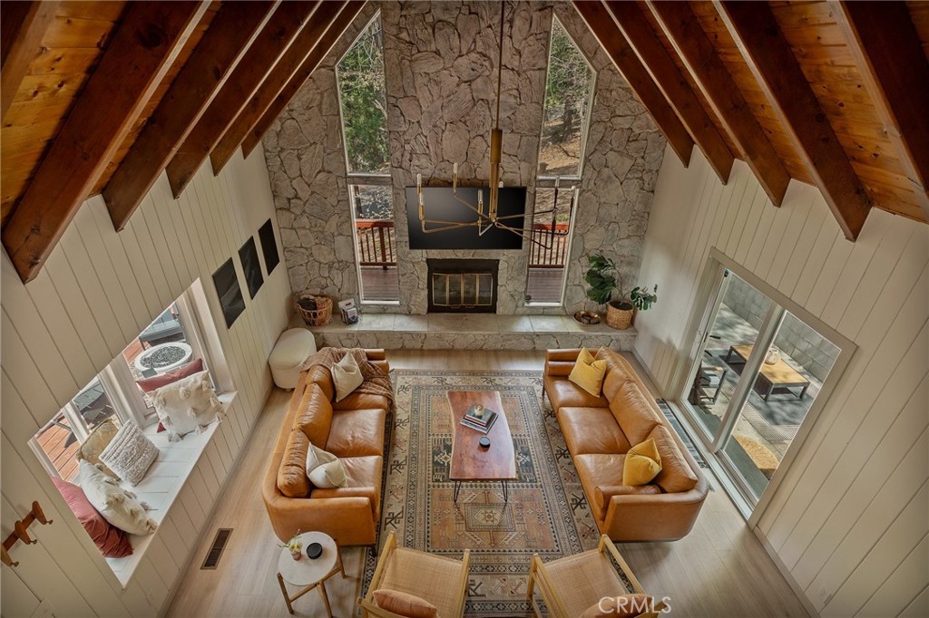 373 Summit Road Lake Arrowhead, CA 92352 - Photo 32 of 41 a view of living room with furniture and fireplace