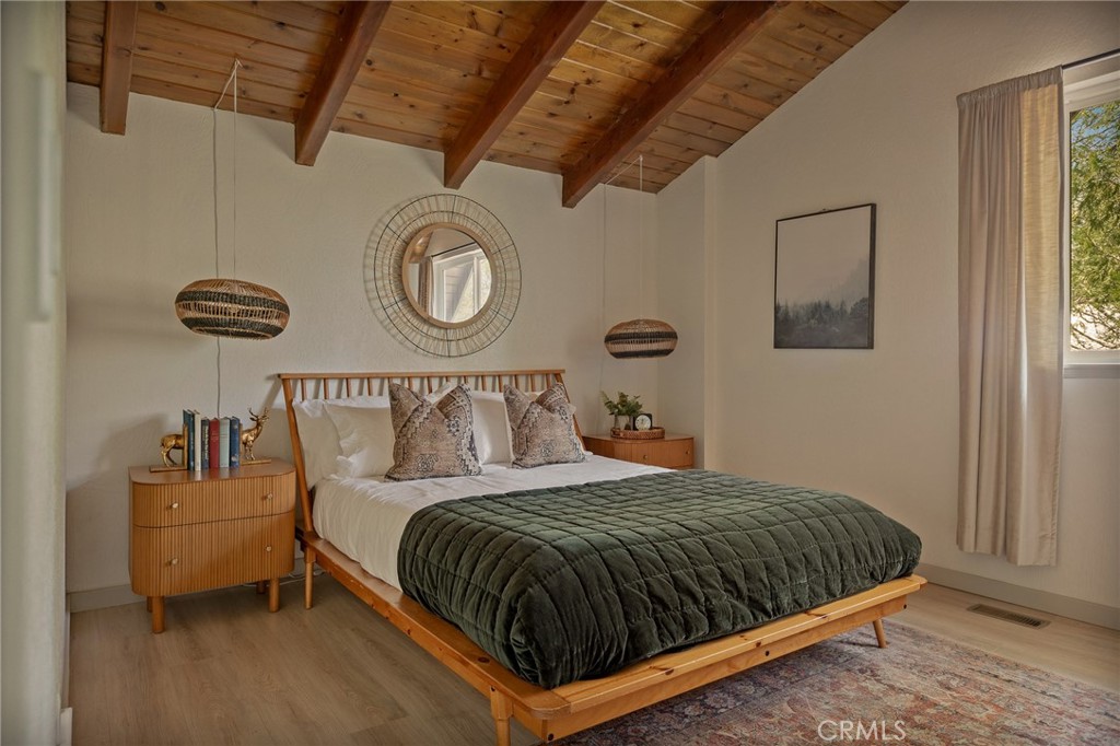 373 Summit Road Lake Arrowhead, CA 92352 - Photo 7 of 41 a bedroom with a bed and a window