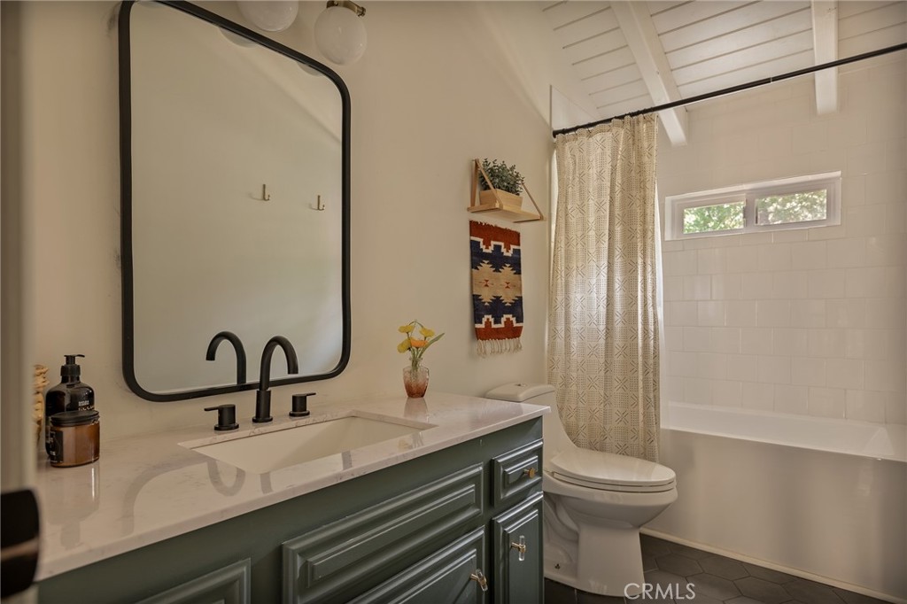 373 Summit Road Lake Arrowhead, CA 92352 - Photo 8 of 41 a bathroom with a sink and a toilet