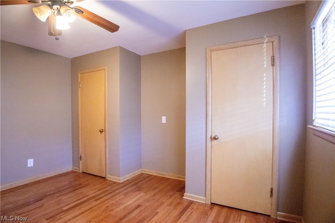 7674 Ragall Parkway Cleveland, OH 44130 - Photo 17 of 32 bedroom with ceiling fan and light hardwood flooring