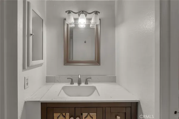 a bathroom with a shower a toilet and a shower