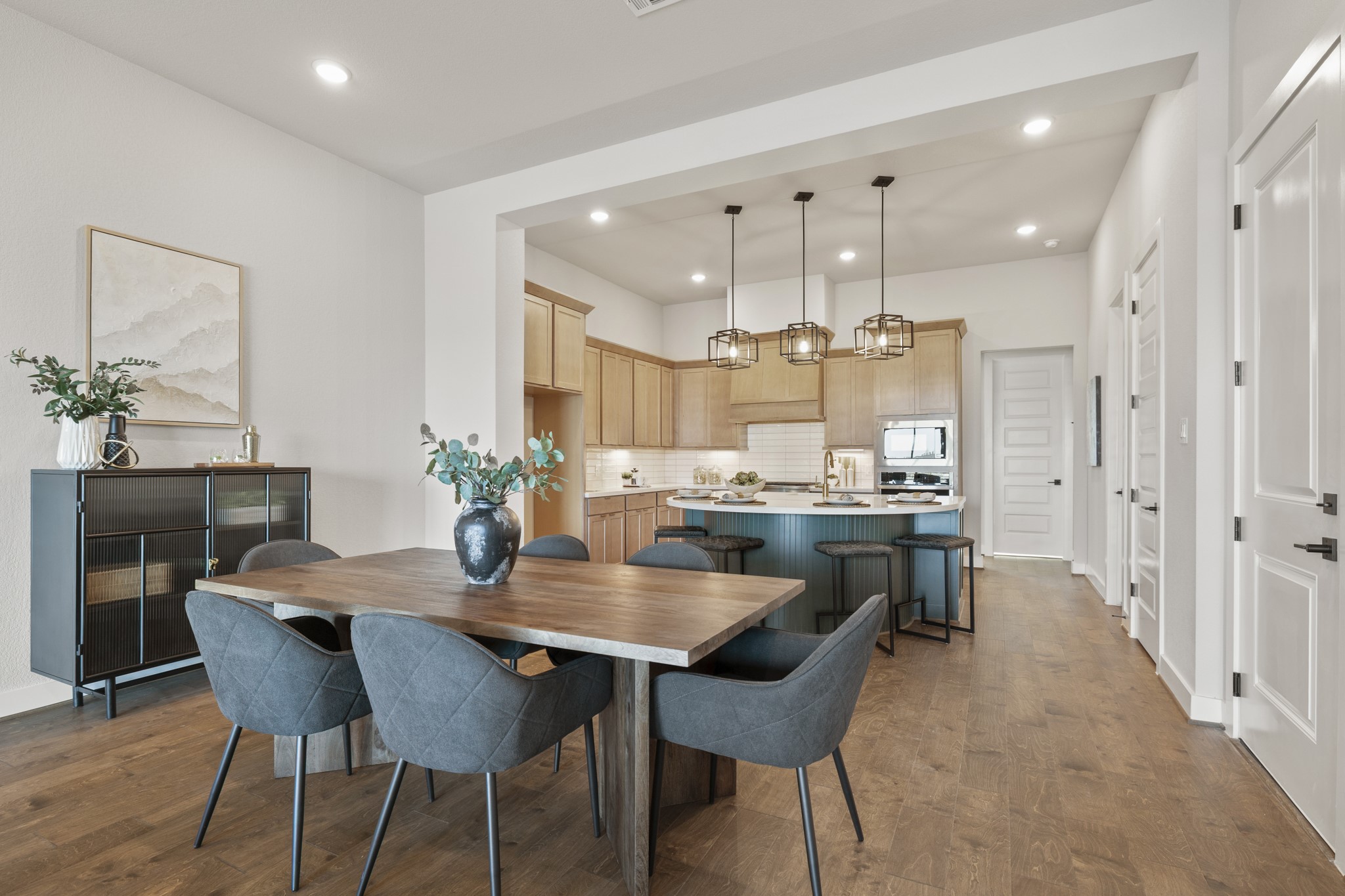 4412 Tucker Lane Seabrook, TX 77586 - Photo 11 of 41 a view of a dining room with furniture and wooden floor