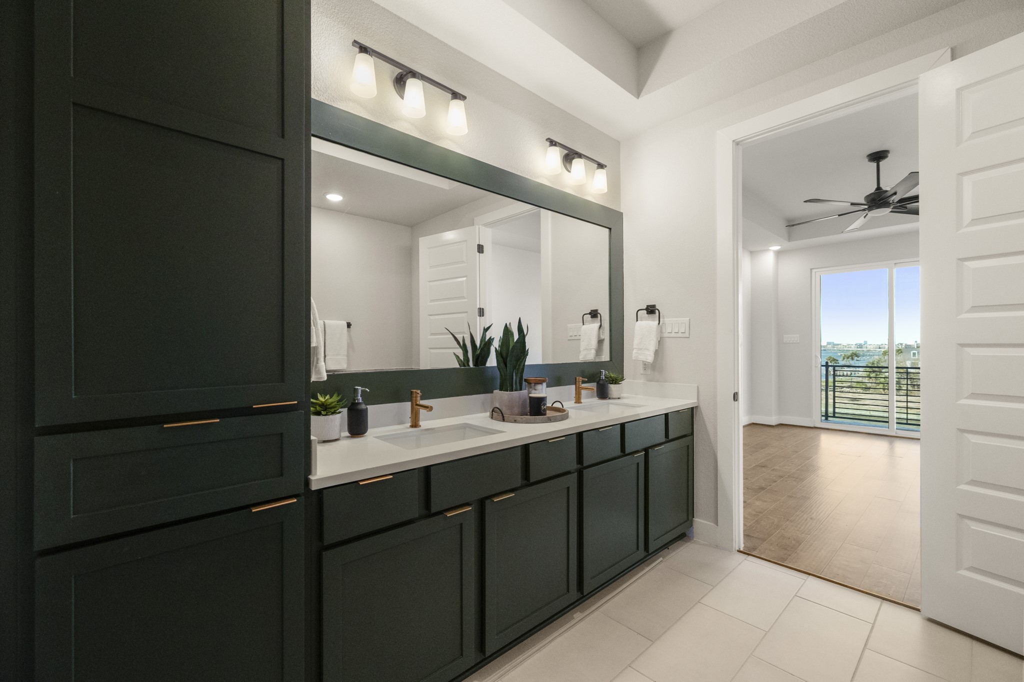 4412 Tucker Lane Seabrook, TX 77586 - Photo 18 of 41 a bathroom with a double vanity sink and mirror