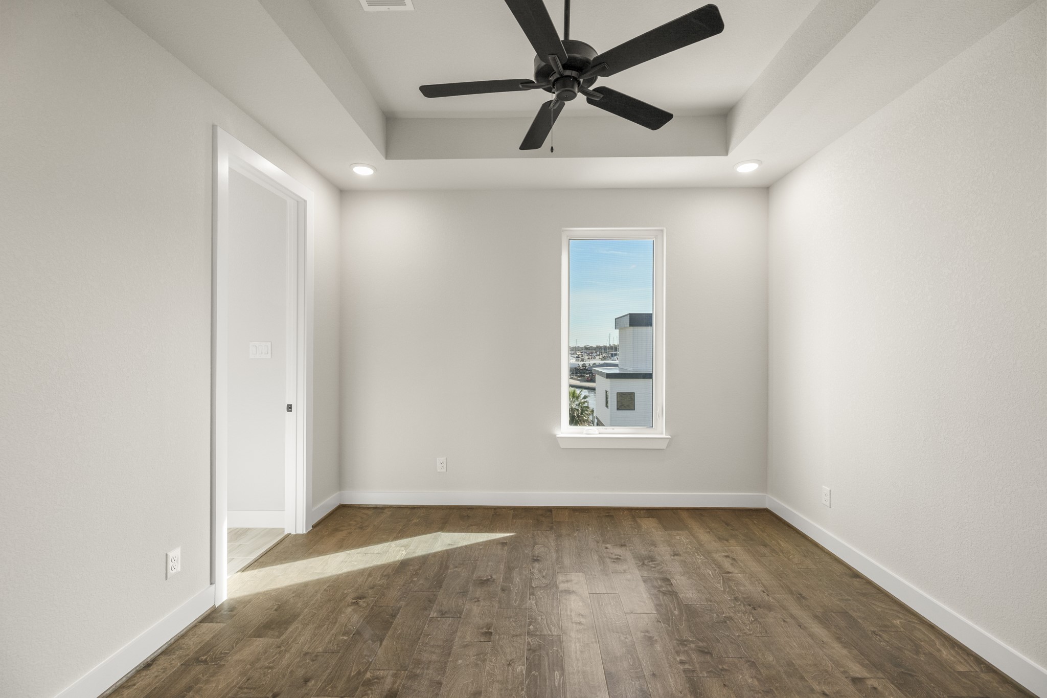 4412 Tucker Lane Seabrook, TX 77586 - Photo 24 of 41 a view of empty room with wooden floor