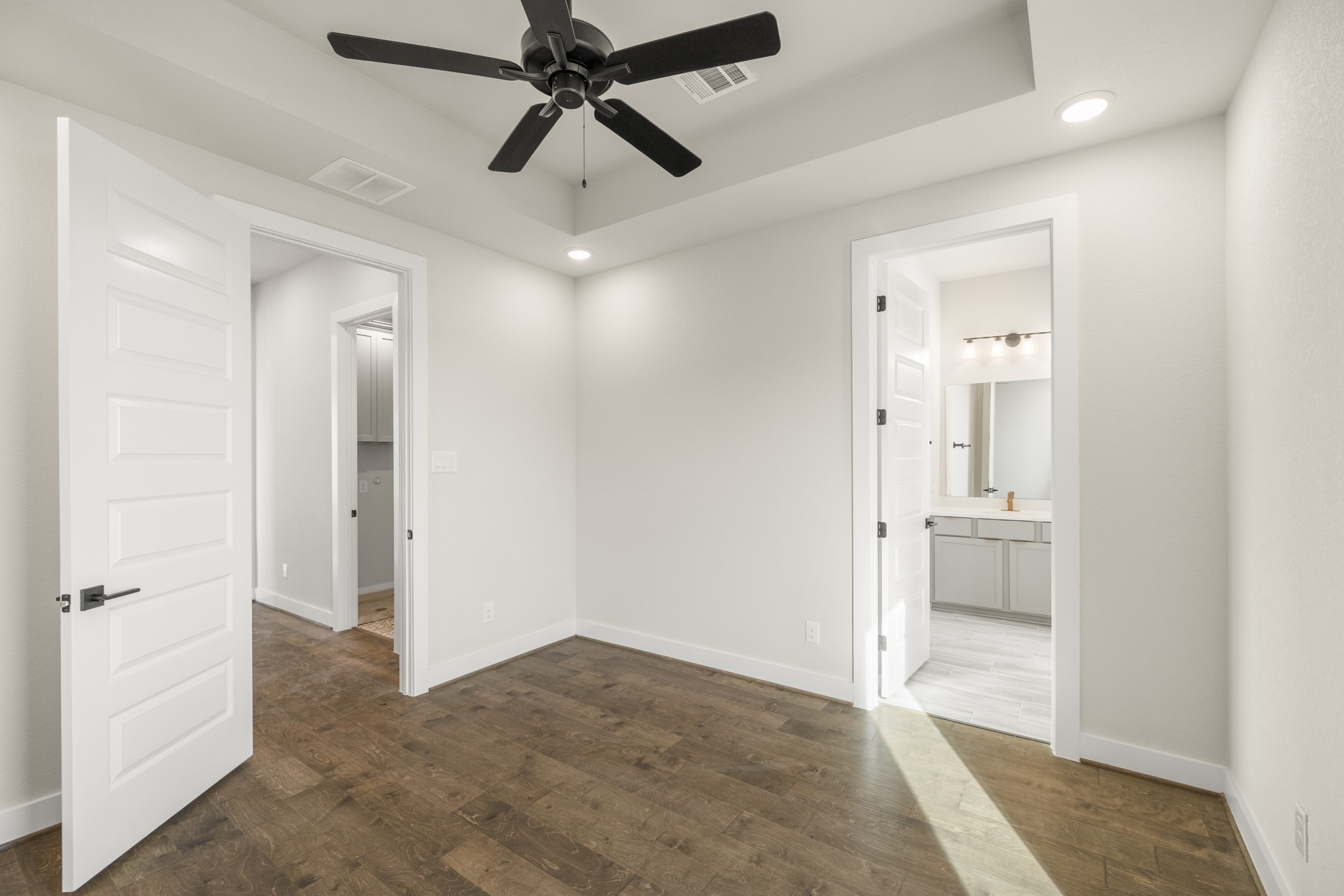 4412 Tucker Lane Seabrook, TX 77586 - Photo 25 of 41 wooden floor in an empty room and a bathroom