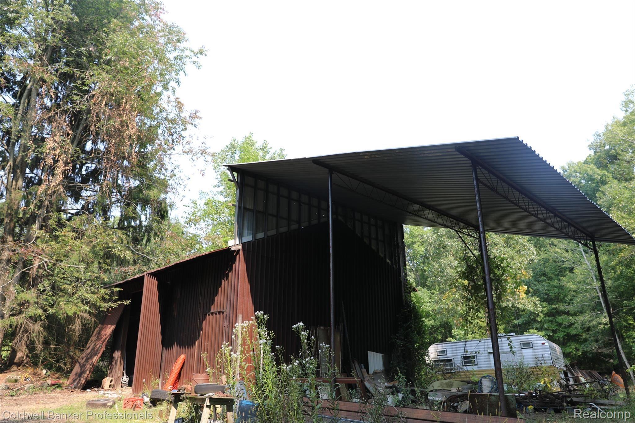 9080 Pine Knob Road Clarkston, MI 48348 - Photo 15 of 26 Rear Barn with XXL Overhang