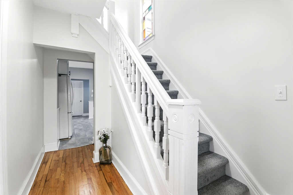 26 Forest Street Springfield, MA 01108 - Photo 6 of 32 a view of entryway with wooden floor