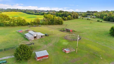 a view of a lake with a yard