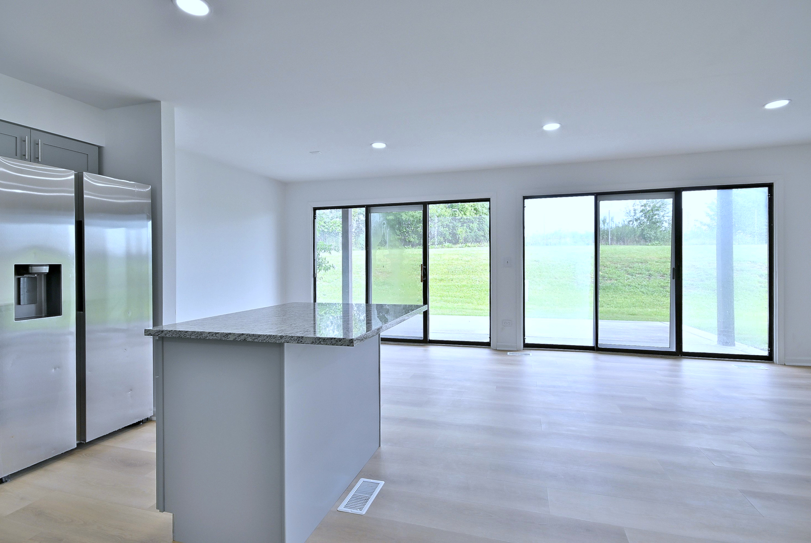 1395 Alpine Court, Unit C Hanover Park, IL 60133 - Photo 4 of 31 a view of an empty room with a window