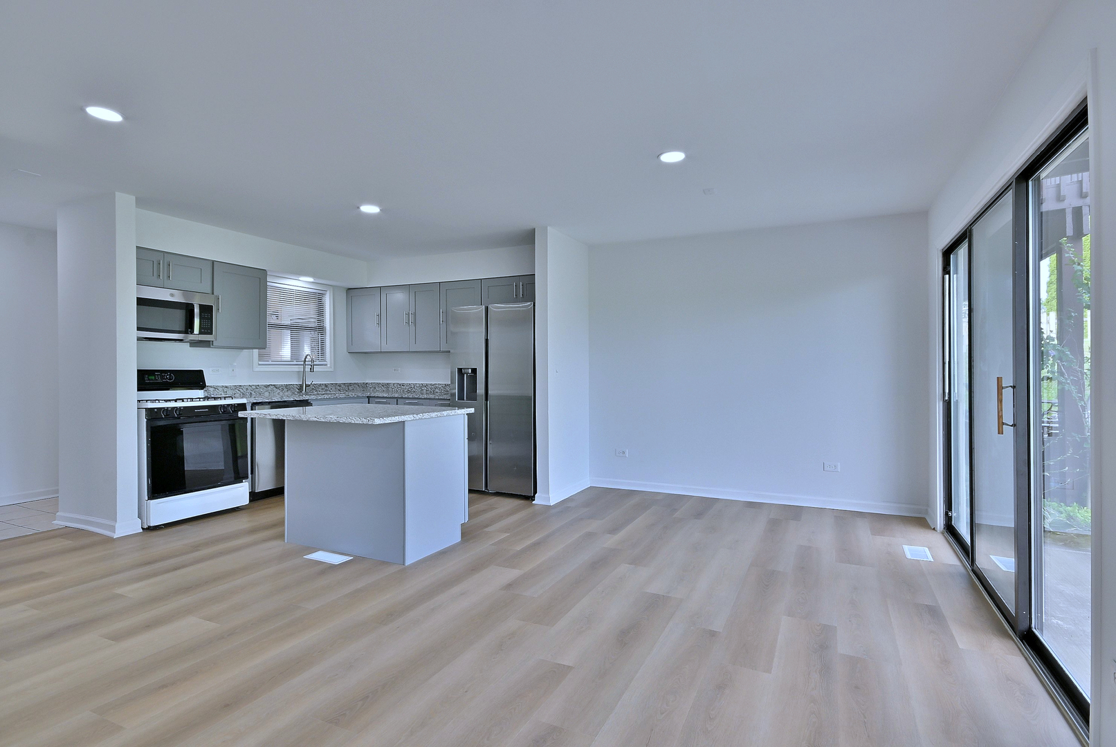 1395 Alpine Court, Unit C Hanover Park, IL 60133 - Photo 10 of 31 a view of kitchen with wooden floor