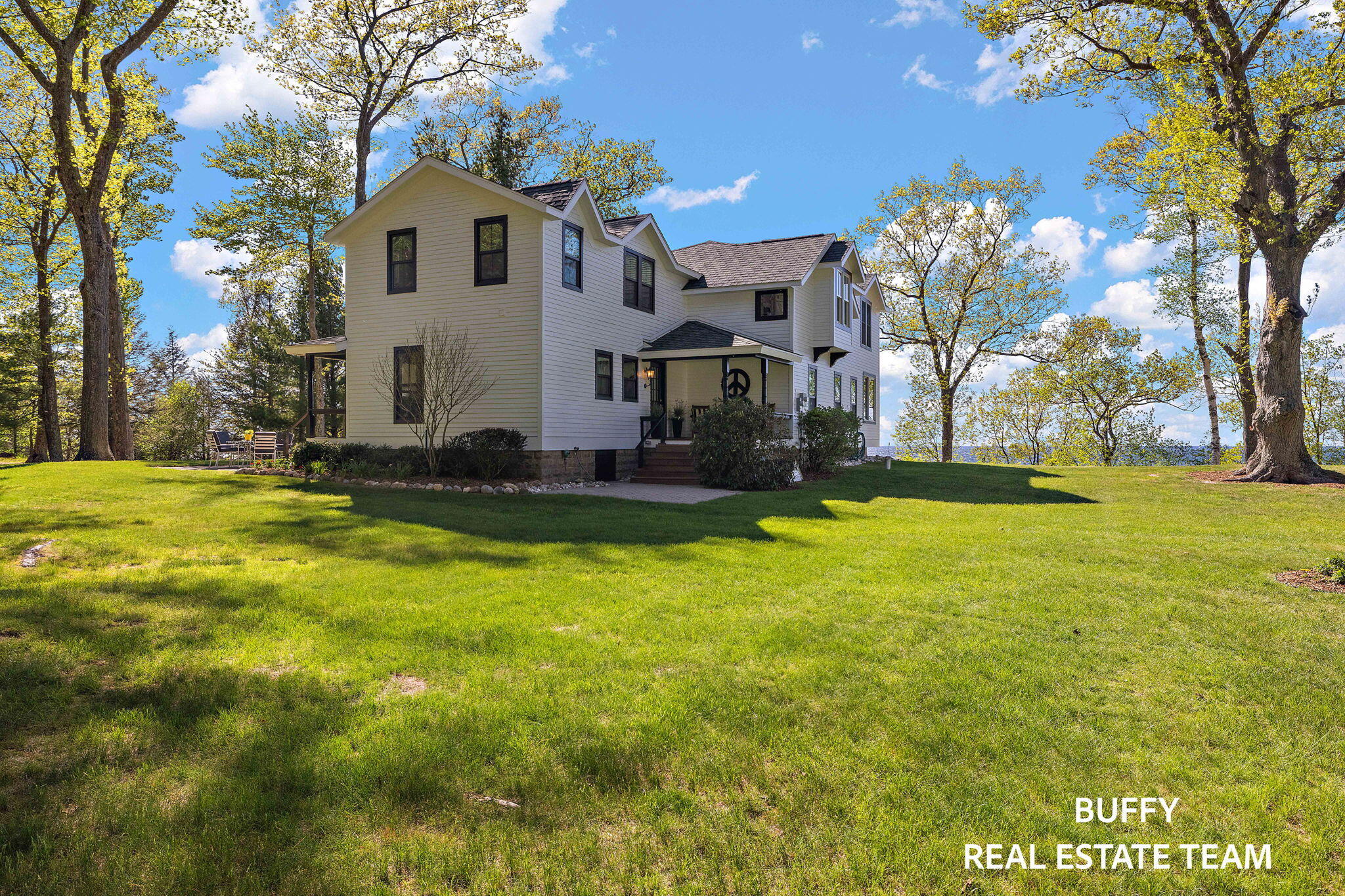 8282 West Harrison Road Mears, MI 49436 - Photo 15 of 146 Main House Side View