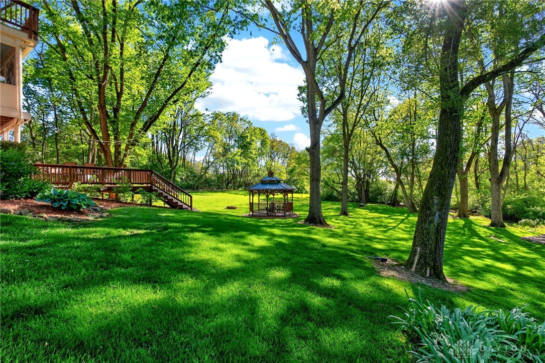 330 South Alpha Bellbrook Road Bellbrook, OH 45305 - Photo 53 of 87 This lush green yard offers a tranquil retreat with ample space and a charming gazebo.