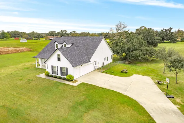 a view of a house with a ocean view
