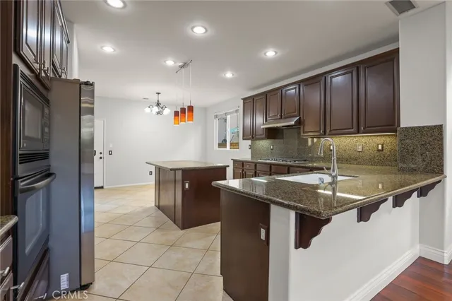 a living room with furniture fireplace and a flat screen tv