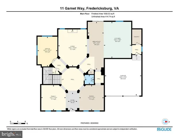 a front view of a house with sitting area