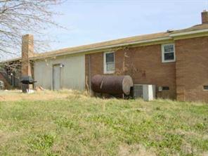 2917 Morgan Mill Road Monroe, NC 28110 - Photo 2 of 2 a backyard of a house with seating space