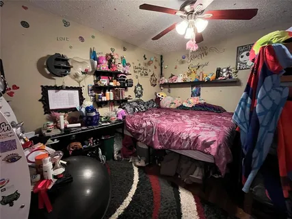 a kitchen with stainless steel appliances granite countertop a stove and cabinets