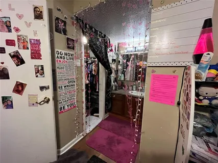 a kitchen with a sink cabinets and a stove