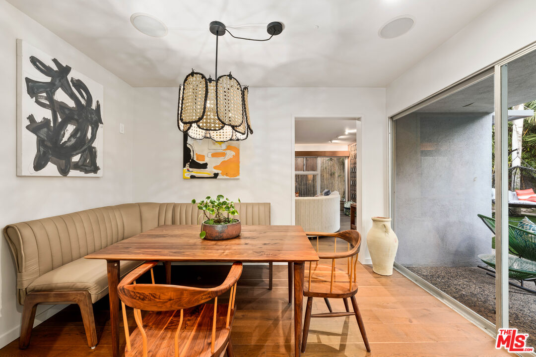 1116 Berkeley Drive Venice, CA 90292 - Photo 13 of 30 a view of a dining room with furniture and wooden floor