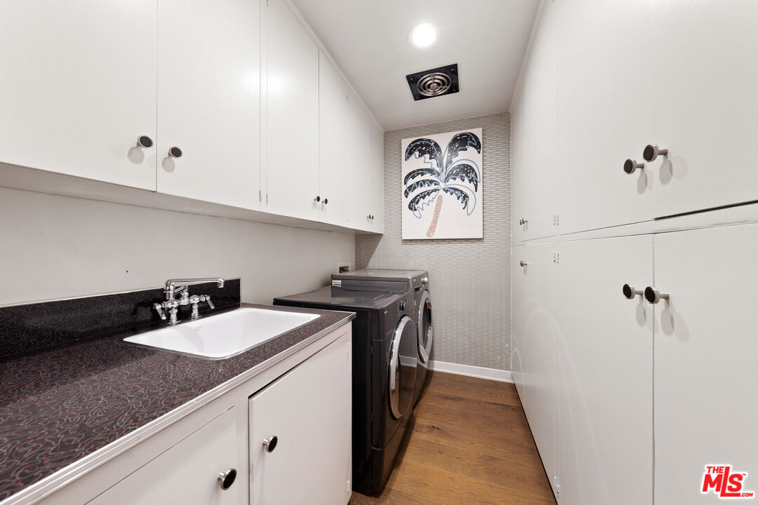 1116 Berkeley Drive Venice, CA 90292 - Photo 15 of 30 a kitchen with a sink and cabinets