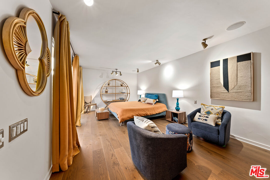 1116 Berkeley Drive Venice, CA 90292 - Photo 16 of 30 a living room with furniture and a chandelier