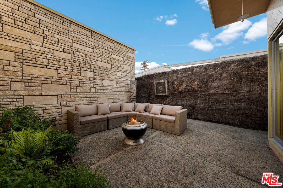 1116 Berkeley Drive Venice, CA 90292 - Photo 18 of 30 a backyard of a house with outdoor seating