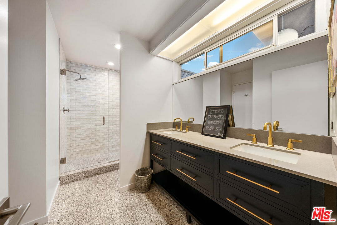 1116 Berkeley Drive Venice, CA 90292 - Photo 20 of 30 a bathroom with a sink double vanity and shower