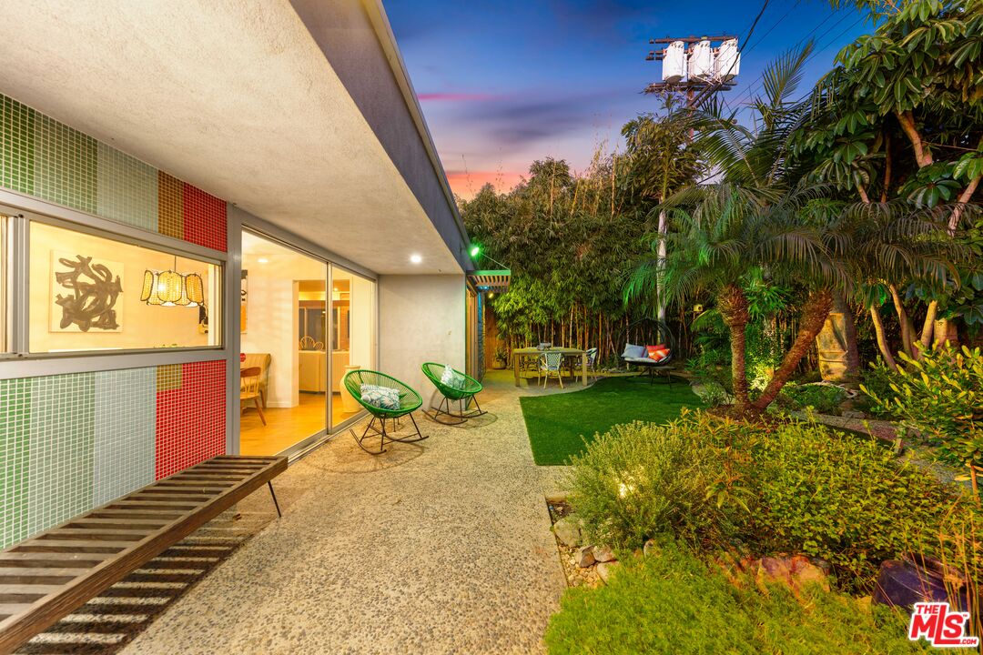 1116 Berkeley Drive Venice, CA 90292 - Photo 24 of 30 a backyard of a house with yard table and chairs
