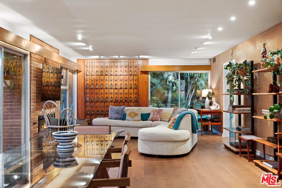 1116 Berkeley Drive Venice, CA 90292 - Photo 5 of 30 a living room with furniture and a large window