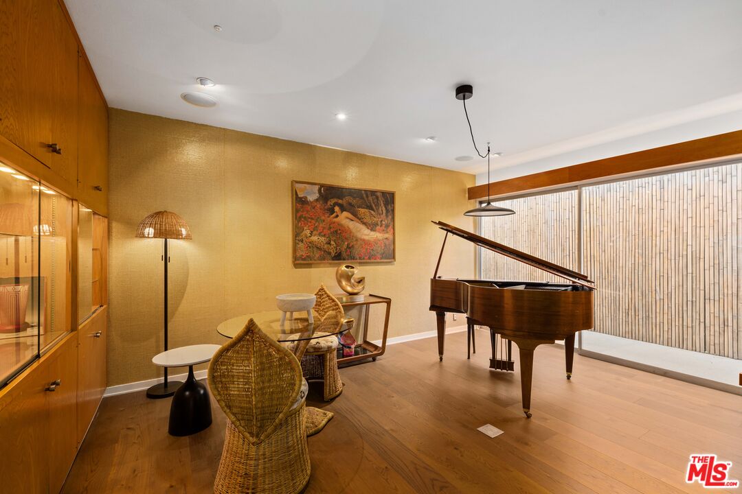 1116 Berkeley Drive Venice, CA 90292 - Photo 10 of 30 a dining room with furniture window and wooden floor
