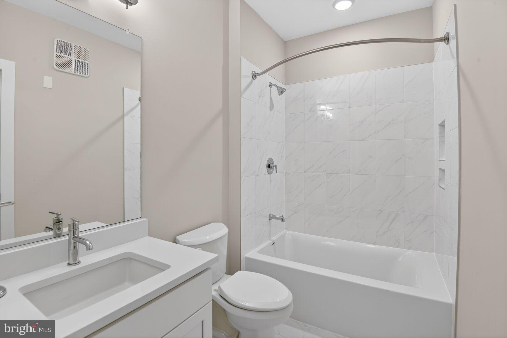 76 Old Mill Bottom Road North, Unit 301 Annapolis, MD 21409 - Photo 13 of 37 a bathroom with a sink toilet and shower