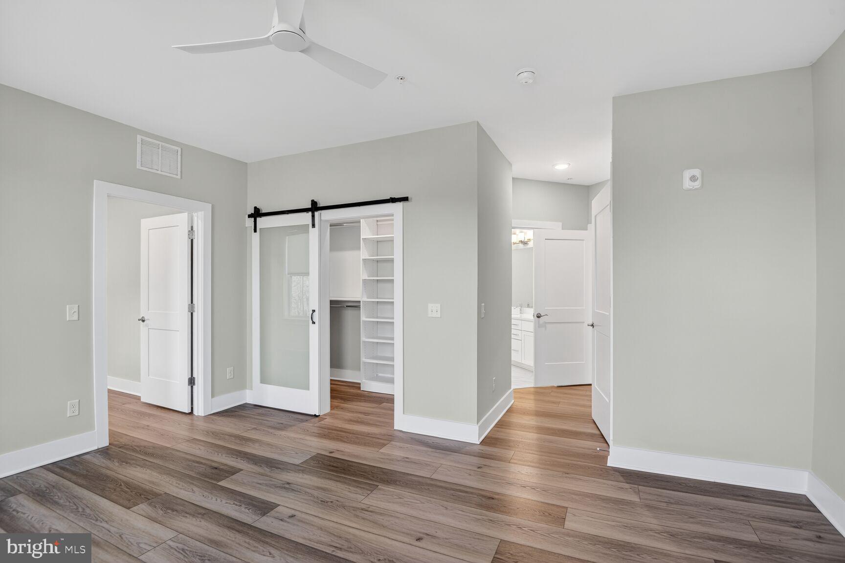 76 Old Mill Bottom Road North, Unit 301 Annapolis, MD 21409 - Photo 9 of 37 a view of empty room with wooden floor