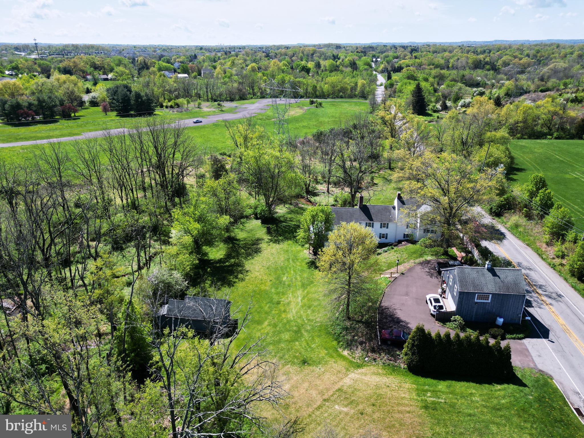3501 Allentown Road Hatfield, PA 19440 - Photo 5 of 6 a view of a garden with a building in the background