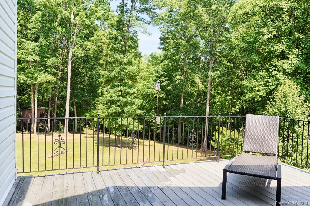 6312 Hastings Road Waxhaw, NC 28173 - Photo 15 of 24 a view of balcony with wooden floor and outdoor seating