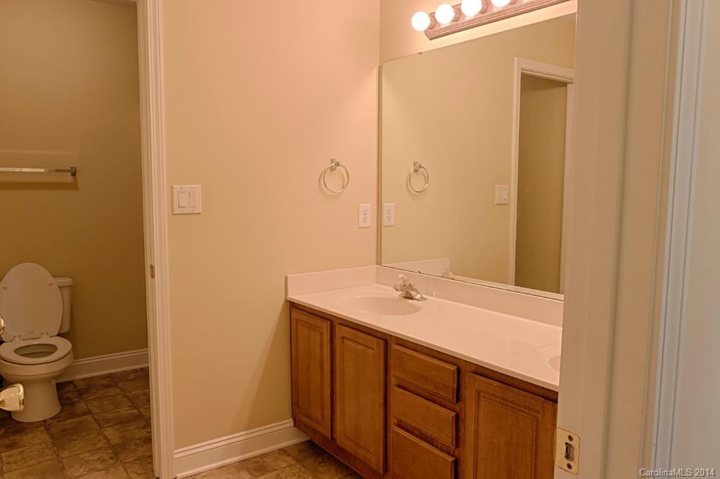 6312 Hastings Road Waxhaw, NC 28173 - Photo 21 of 24 a bathroom with a sink and a mirror