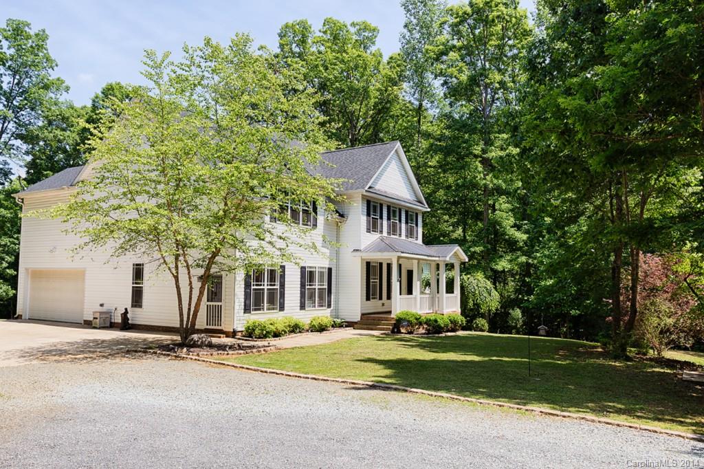6312 Hastings Road Waxhaw, NC 28173 - Photo 23 of 24 a front view of a house with a garden