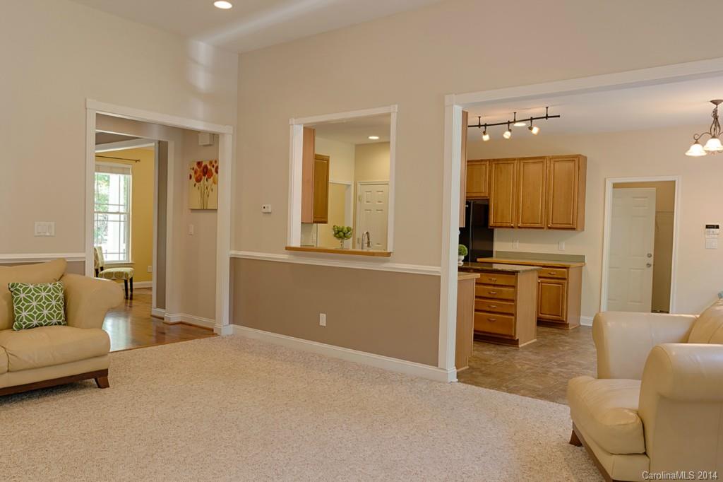 6312 Hastings Road Waxhaw, NC 28173 - Photo 7 of 24 a living room with furniture and kitchen view