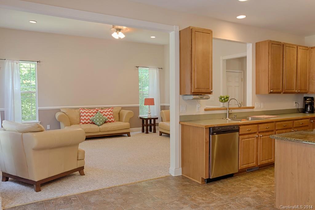 6312 Hastings Road Waxhaw, NC 28173 - Photo 8 of 24 a living room with furniture and kitchen