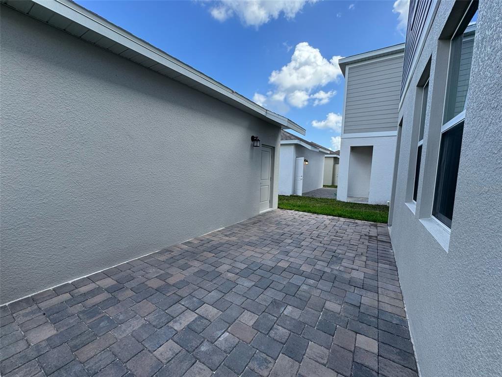 2473 Spring Tune Alley Kissimmee, FL 34744 - Photo 26 of 27 a view of entryway