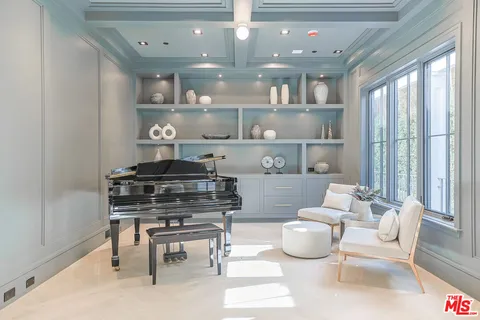 a kitchen with a stove and a refrigerator