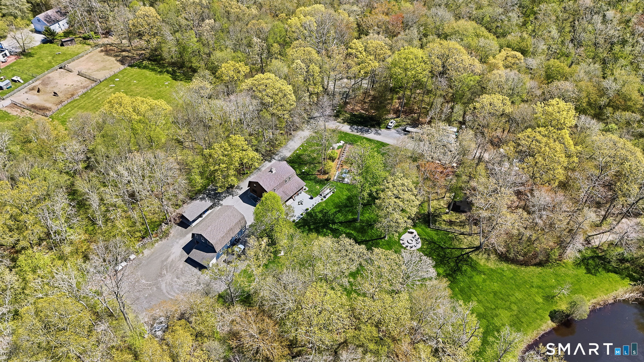 61 Mystic Road North Stonington, CT 06359 - Photo 40 of 40 an aerial view of residential house with outdoor space