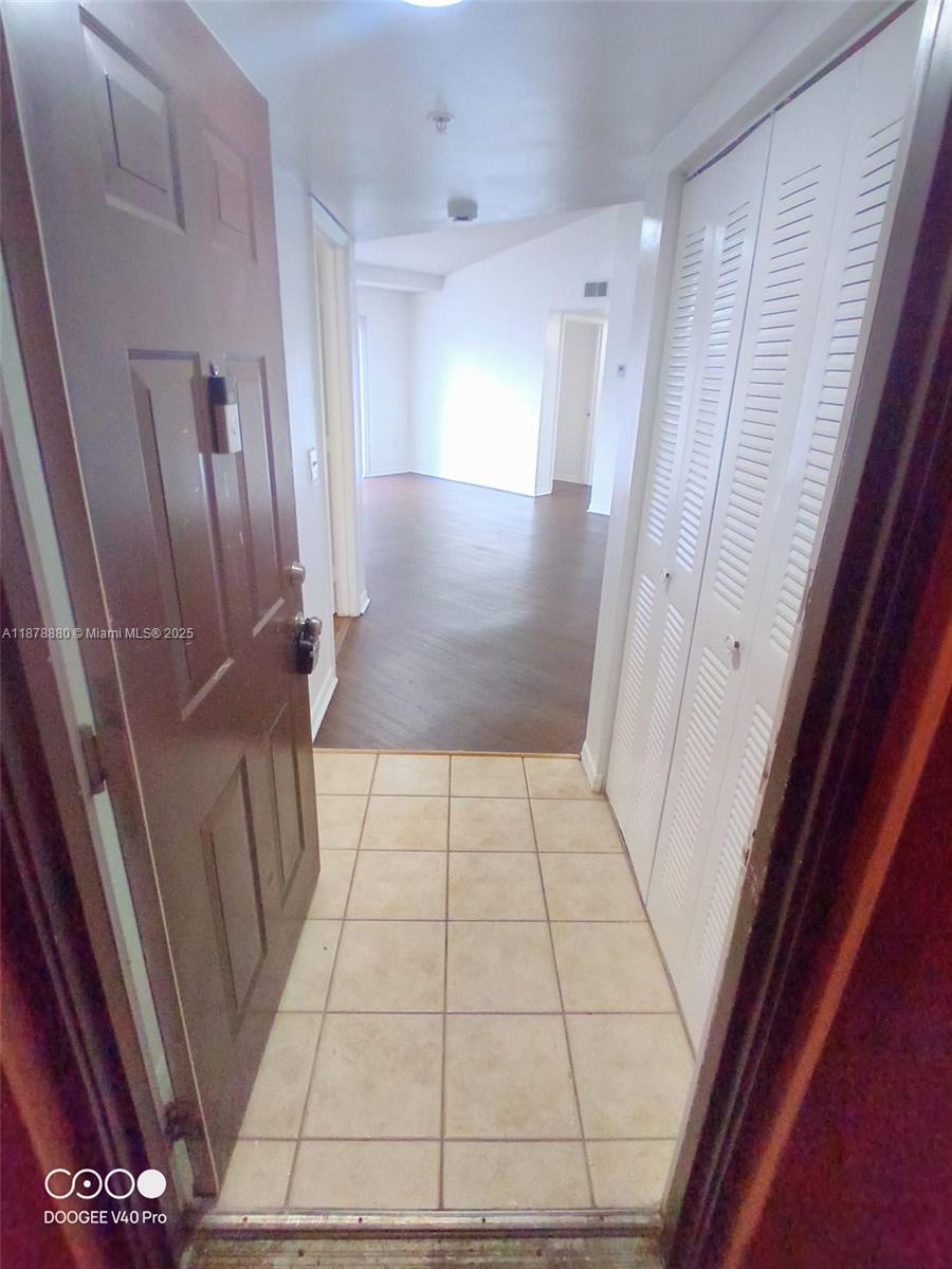4183 Haverhill Road, Unit 712 West Palm Beach, FL 33417 - Photo 3 of 11 a view of an entryway