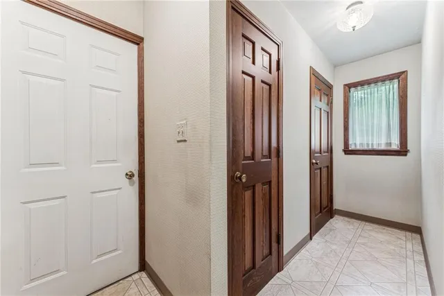 a view of a house with a large window