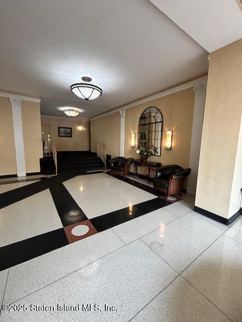 1000 Clove Road, Unit LO Staten Island, NY 10301 - Photo 3 of 13 a living room with furniture and a mirror