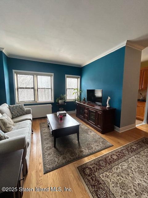 1000 Clove Road, Unit LO Staten Island, NY 10301 - Photo 5 of 13 a living room with furniture and a flat screen tv